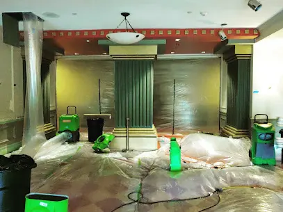 Plastic containment and drying equipment set up in a Lewisville dining room