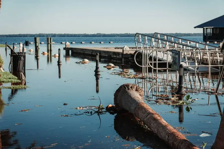 High water over a boat dock and shoreline on a North Texas lake